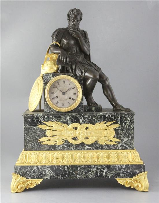 A second quarter of the 19th century gilt and patinated bronze mounted antico verdi marble mantel clock